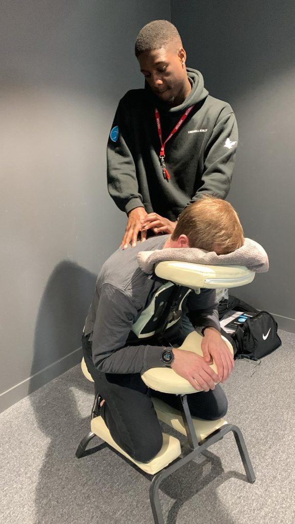 Leon providing chair massage