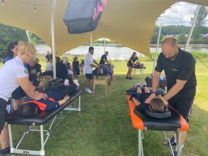 Val and Jonny performing festival massage